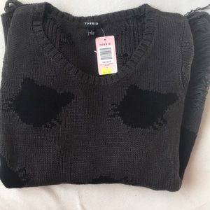 Ripped long sleeve sweater